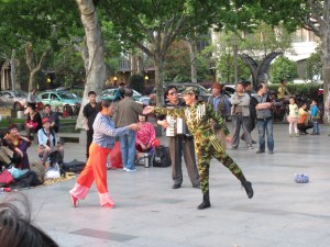 Dancers in a park in Hangzhou. You haven't seen it all until you've seen a ballet-dancing soldier.