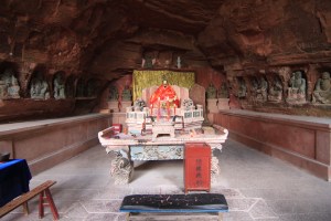 Altar with statues in a cave recess
