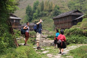 I'm 5'3" and Chris is 6'6", as a comparison to the petite Yao women. Don't be fooled, they could win in arm wrestling against anyone